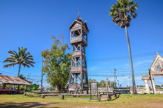 The 100-Year Wooden Bell Tower at Wat Sri Boon Reung